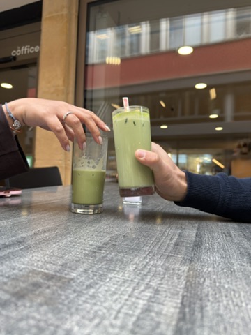 Two matcha lattes served on the Coffice terrace