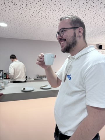 At the Coffice counter, cup in hand